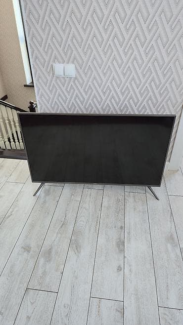 mi 4a: Телевизор LED, диагональ ориентировочно 50–55". Тонкие рамки — 1