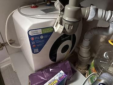 Электрический водонагреватель Aquaverde, предназначенный для установки