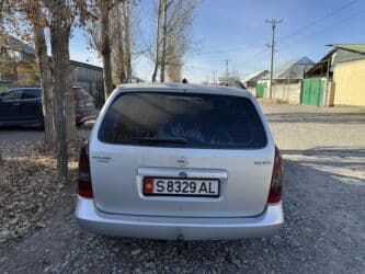 зимнюю резину: Opel Astra: 2004 г., 2 л, Механика, Дизель, Универсал — 5