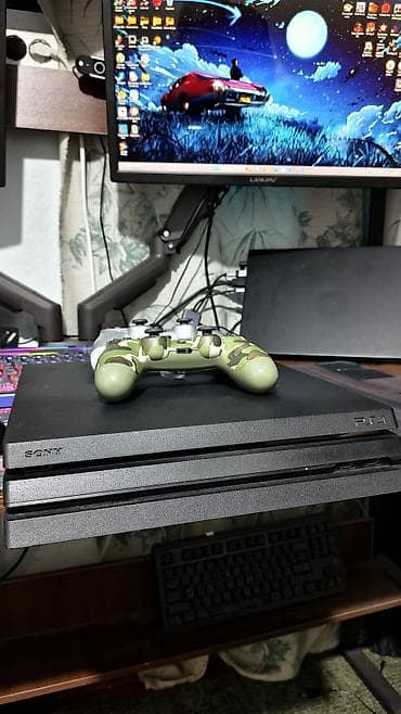 dota 2: Sony PlayStation 4 Pro, черная, комплект с двумя геймпадами DualShock — 3