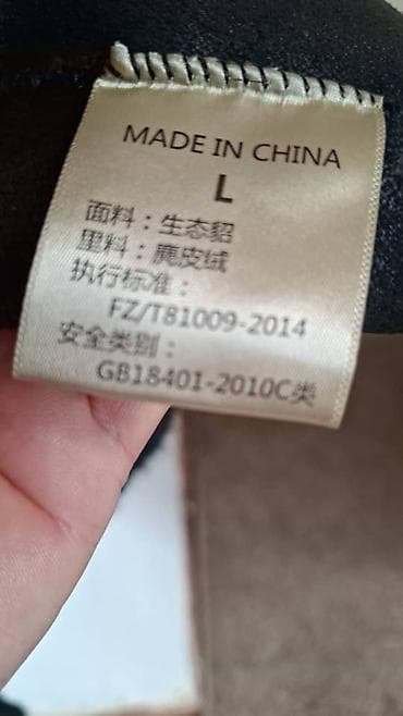 шуба из нерпы женская: Шуба из тёмного меха с оригинальной фактурной отделкой. - Цвет — 2