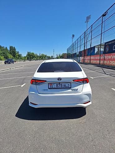 рестайлинг: Toyota Corolla: 2023 г., 1.8 л, Вариатор, Гибрид, Седан — 6