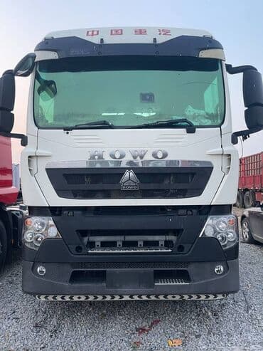 шины разноширокие: Тягач, Howo, 2021 г., Бортовой — 1