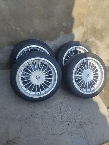 Дөңгөлөктөр монтажда 40 / R 18, Колдонулган, тешиктери - 5 — 1