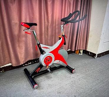 Велосипеды: Спин-байк (велотренажёр) для домашних и студийных тренировок - Тип — 1