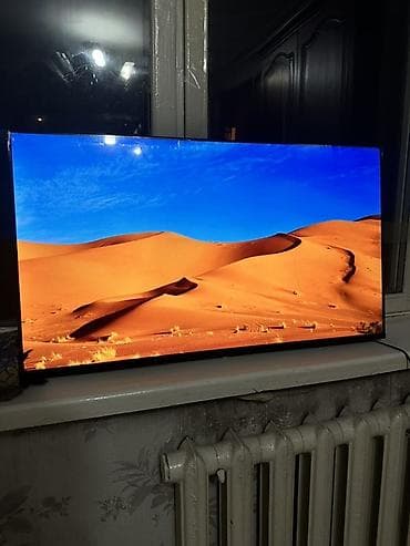 google pixel 7a: Смарт‑телевизор на Android TV, диагональ ~43–50". Тонкие рамки — 1