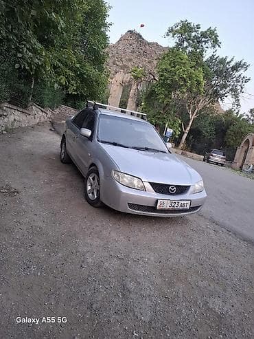 фиат сейченто: Mazda 323: 2003 г., 1.6 л, Механика, Бензин, Седан — 3