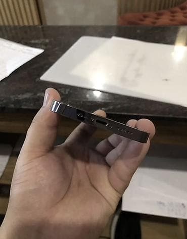 про 14: IPhone 14 Pro, Б/у, 128 ГБ, Deep Purple, Чехол, 78 % — 5