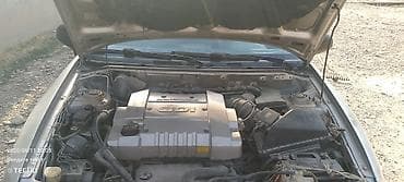 uni v: Mitsubishi Carisma: 2001 г., Механика, Бензин, Седан — 6