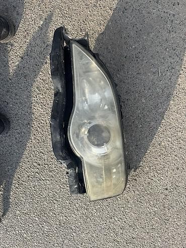 Передняя левая фара Subaru
