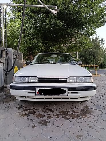 крути шторм: Mazda 626: 1988 г., 2 л, Механика, Бензин, Седан — 1