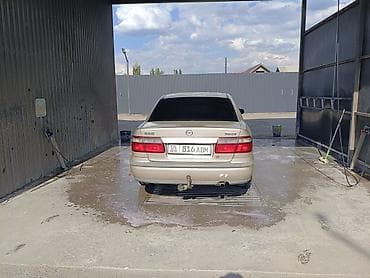 Mazda 626: 1999 г., Механика, Бензин, Седан