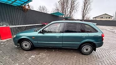 некая 3: Mazda Familia: 2003 г., 1.6 л, Автомат, Бензин, Универсал — 3