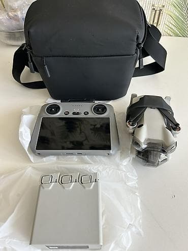 DJI Mini 4 Pro Fly More Combo с пультом DJI RC (встроенный экран)