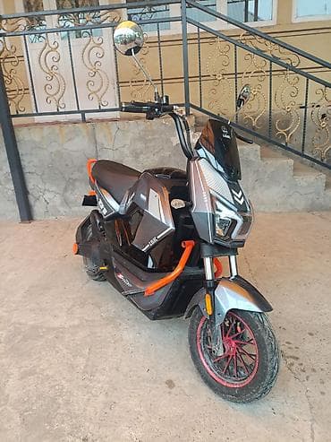 mini kuper: Электроскутер (городской) с агрессивным дизайном и яркими акцентами — 1