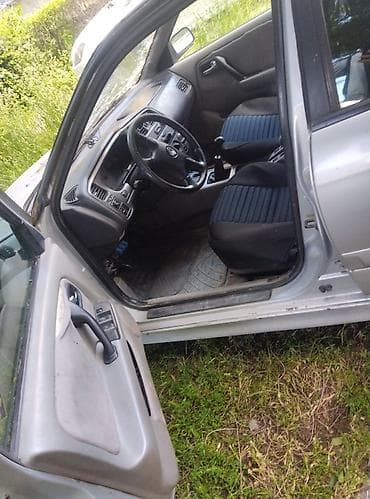 портер капот: Nissan Primera: 2001 г., 1.8 л, Универсал — 6