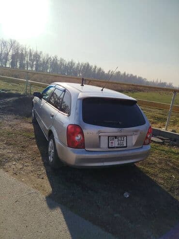 шины на гольф 2: Mazda 323: 2003 г., 1.3 л — 7