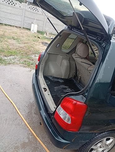 митсубиси спейк стар: Mazda Demio: 1997 г., 1.3 л, Автомат, Бензин — 6