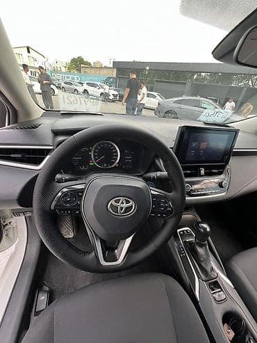 тайото кароло: Toyota Corolla: 2022 г., 1.8 л, Гибрид, Седан — 7