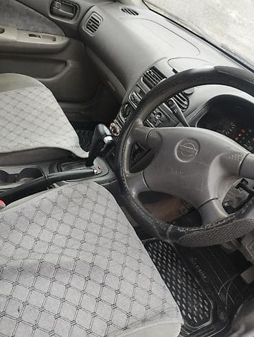 Nissan Sunny: 2000 г., 1.5 л, Автомат, Седан — 9