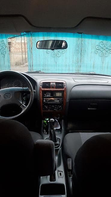 bmw e65: Mazda 626: 1997 г., 1.8 л, Механика, Бензин, Хэтчбэк — 8