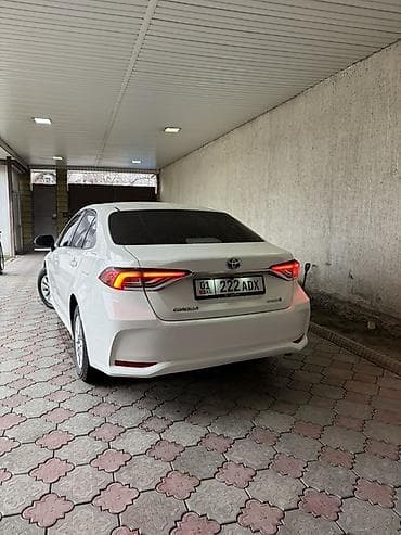 crown 2018: Toyota Corolla: 2019 г., 1.8 л, Вариатор, Гибрид, Седан — 7