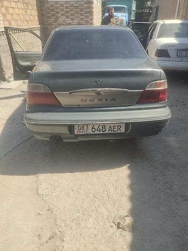 Daewoo Nexia: 2005 г., Кол менен иштөөчү, Бензин, Седан
