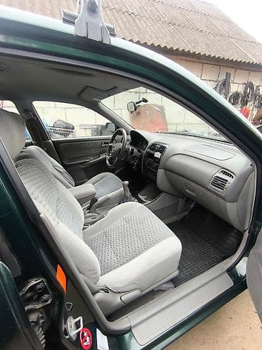 Mazda 626: 1999 г., 1.8 л, Механика, Бензин, Седан — 8