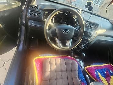 киа рио 3: Kia Rio: 2014 г., 1.6 л, Автомат, Бензин, Седан — 4