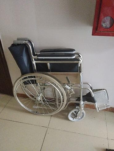 Инвалидная коляска с ручным приводом за 7000сом(торг уместен) -