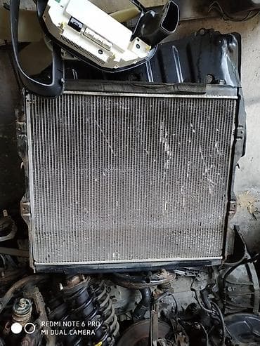 радиоторы: Масляный радиатор Toyota 2004 г., Б/у, Оригинал — 1