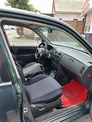 Продажа авто: Daihatsu Sirion: 2003 г., 1 л, Механика, Бензин, Хэтчбэк — 5