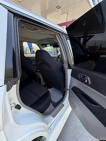 капот кобальт: Subaru Forester: 2005 г., Универсал — 9