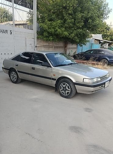 2 gz: Mazda 626: 1990 г., Седан — 1