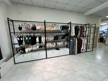 оборудование в бутик: Стеллажи для бутика одежды Кронштейны для бутика одежды Торговое — 22