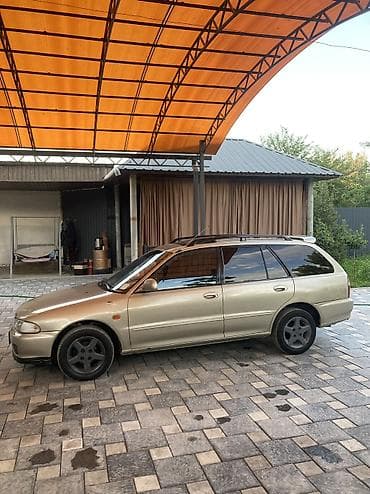 Mitsubishi Lancer: 1995 г., 1.6 л, Автомат, Бензин, Универсал