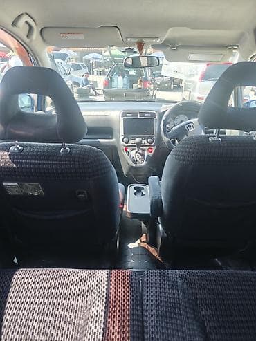 3 sfe: Honda Stream: 2003 г., 2 л, Автомат, Бензин, Минивэн — 9