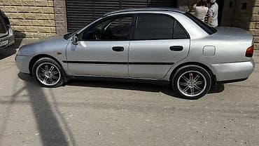 Mitsubishi Carisma: 1999 г., 1.6 л, Механика, Бензин, Седан