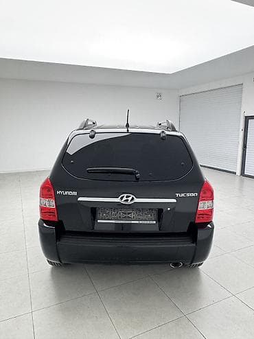 Транспорт: Hyundai Tucson: 2006 г., 2 л, Автомат, Бензин, Кроссовер — 7