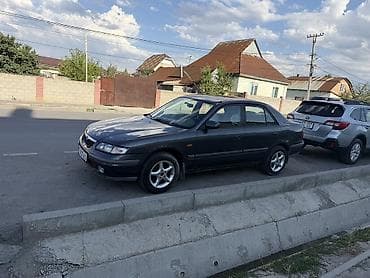 Унаа: Mazda 626: 1999 г., 2 л, Кол менен иштөөчү, Бензин, Седан — 2