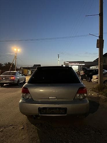 аудио техника: Subaru Impreza: 2004 г., 1.5 л, Автомат, Бензин, Универсал — 4