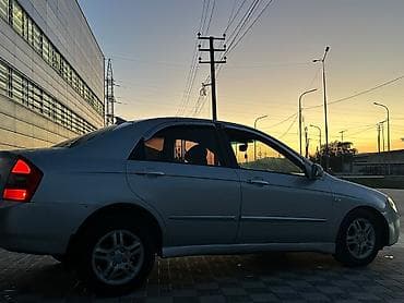 именные рамки на авто: Продаётся седан Kia Cerato серебристого цвета. Автомобиль 4-дверный — 2