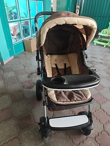 Детская прогулочная коляска с перекидной ручкой. Основные