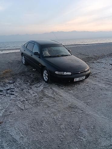 ml 163: Mazda 626: 1992 г., Седан — 2