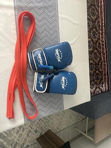 Набор для единоборств и тренировок: - Боксерские перчатки TOP TEN