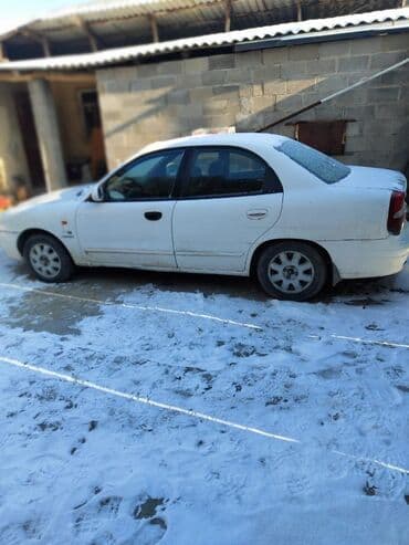 крыло нексия 1: Daewoo Nubira: 1999 г., 1.6 л, Механика, Бензиновая, Седан — 4