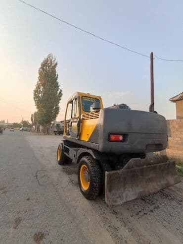 экскаватор погрузчик жсб: Экскаватор, Volvo, 1997 г., Колесный — 6