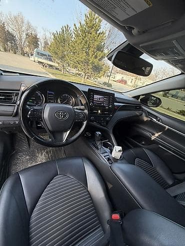 tayota progres: Toyota Camry: 2021 г., 2.5 л, Автомат, Гибрид, Седан — 10