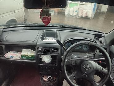 Nissan Cube: 1999 г., 1.3 л, Автомат, Хэтчбэк