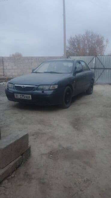 Mazda 626: 1997 г., 1.8 л, Механика, Бензин, Седан